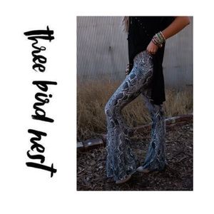 NWOT snakeskin patterned flair pants